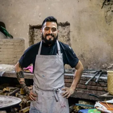 a man standing in front of a building