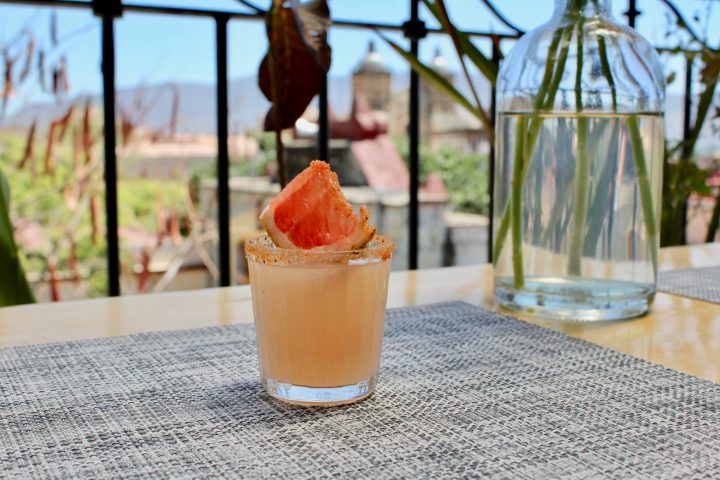 a close up of a glass cup on a table