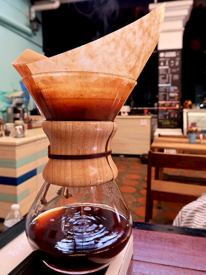 a close up of a glass cup on a table